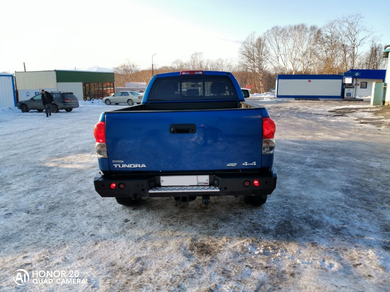 Бампер РИФ силовой задний Toyota Tundra 2007-09.2013 с квадратом под фаркоп и фонарями